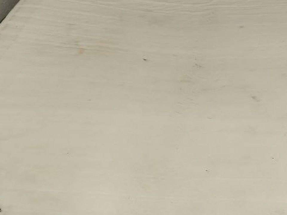 Beispiel: Fleck und Matratzenstoff aus der Nähe fotografieren